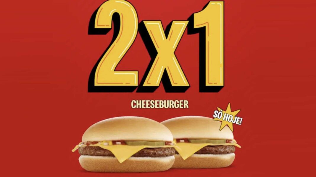 Imagem promocional com fundo vermelho mostrando dois cheeseburgers suculentos lado a lado, representando a oferta 