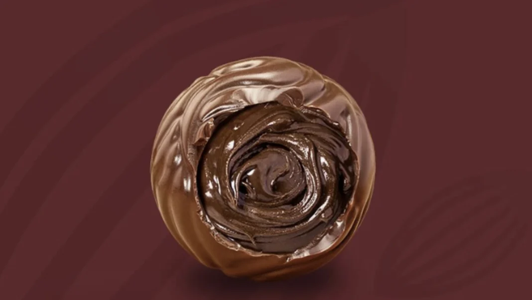 Trufa de chocolate recheada com Ganache escura sobre fundo vermelho e a frase 'GANHE TRUFAS 30g de graça!'