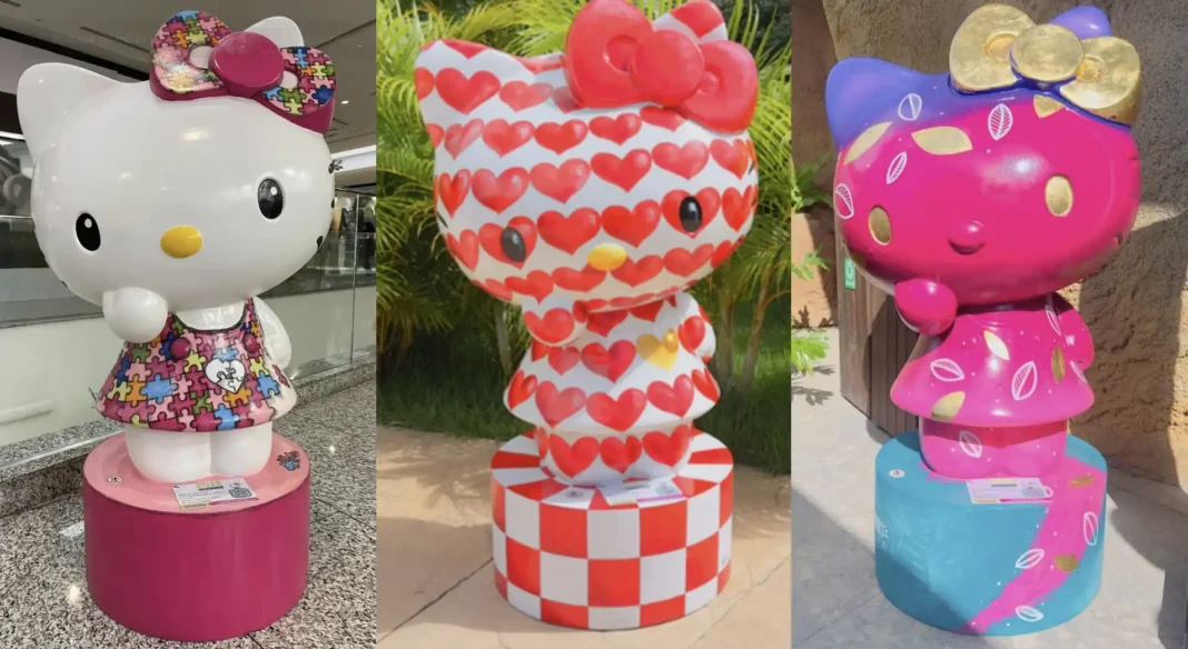Esculturas da Hello Kitty em exposição no Passo Fundo Shopping, com diferentes estilos e cores criadas por artistas brasileiros.