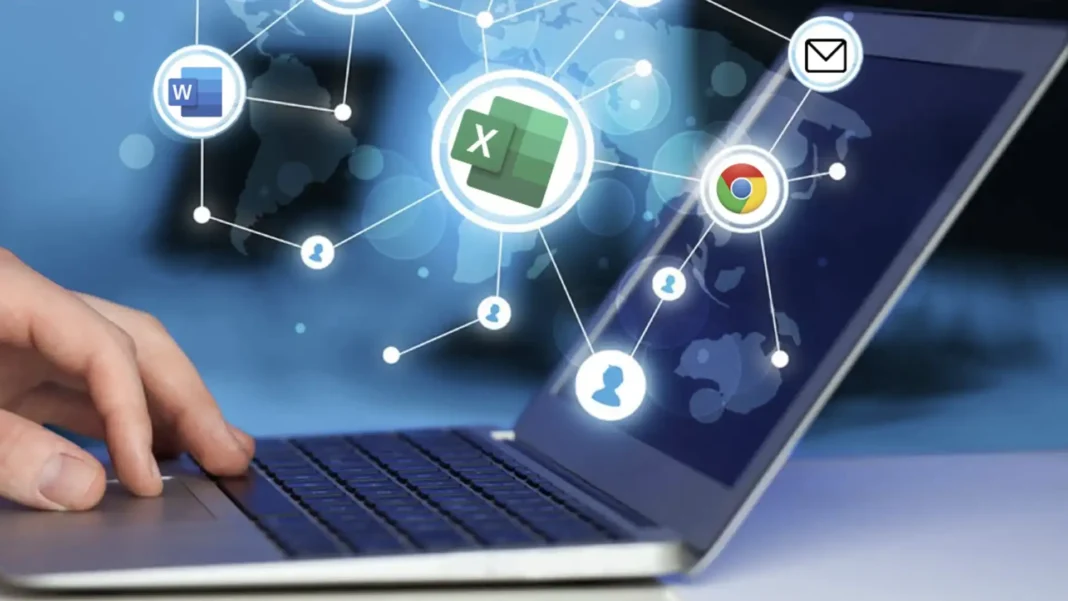 Mão em um laptop com ícones de aplicativos e rede social flutuando na tela.