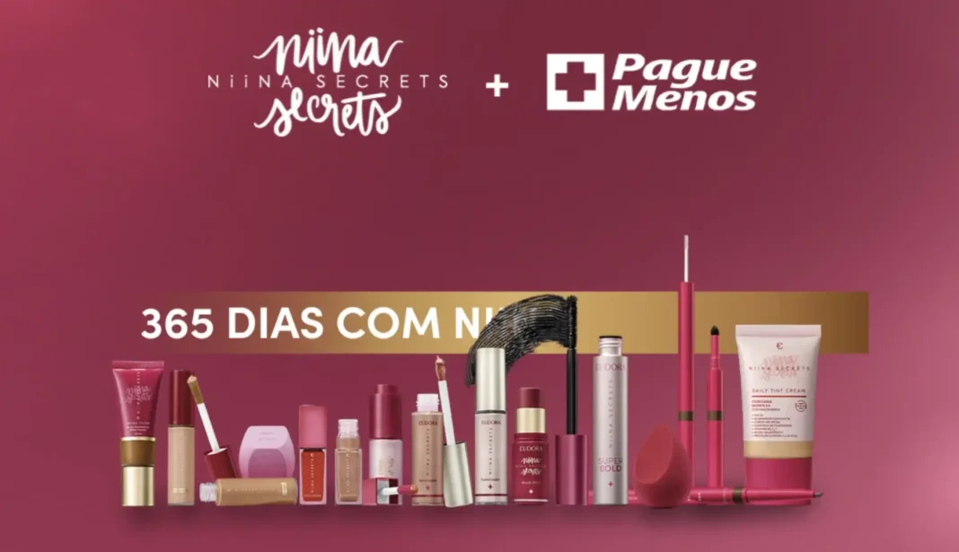 Banner da campanha de parceria entre Niina Secrets e Pague Menos. A imagem mostra a logo 'Niina Secrets' e a logo 'Pague Menos', além da frase '365 DIAS COM NIINA'.