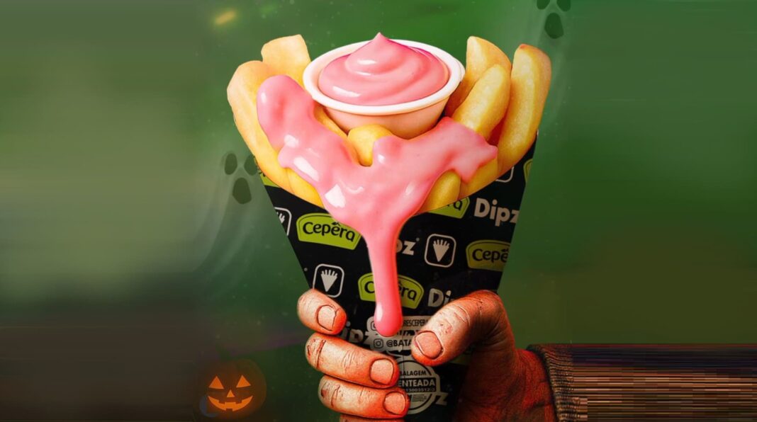 Dipz e Cepêra lançam campanha “Halloween de Outro Mundo” com cone especial grátis Batatas fritas em cone especial Dipz e Cepêra com molho rosa escorrendo, em campanha de Halloween.